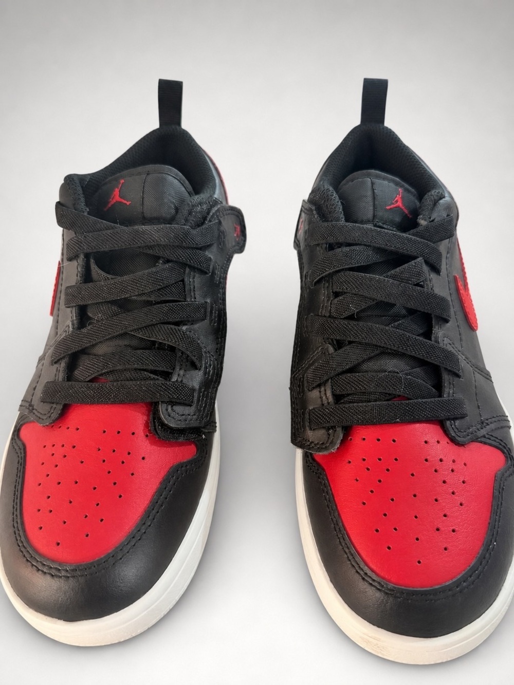 Jordan Low-Top Sneakers in Black and Red